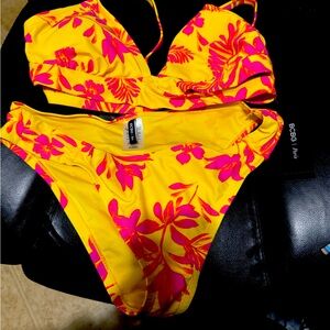 Cute bikini yellow with pink flowers.